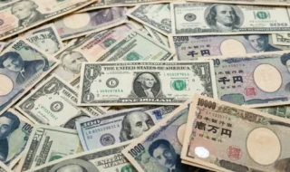 Dolár a jen v súboji: Prečo ani zásah centrálnych bánk nezastavil pád japonskej meny? Americký dolár a japonský jen